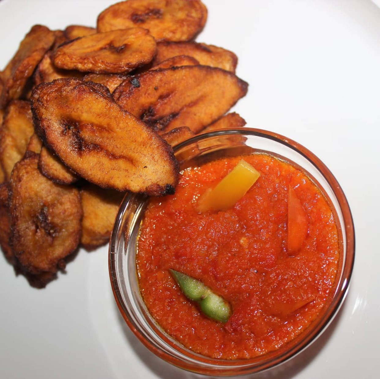 Fried/roasted Plantain with Pepper sauce